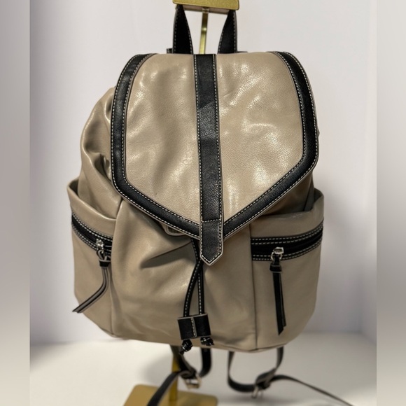 Stylish Tan and Black  Backpack purse in like new condition - Picture 1 of 10